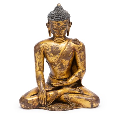 Lot 751 - A Tibetan Gilt Bronze Figure of Shakyamuni
