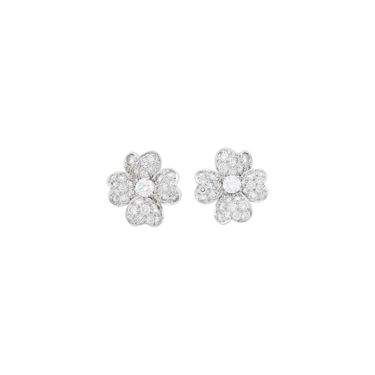 Lot 130 - Van Cleef & Arpels Pair of Platinum and Diamond 'Cosmos' Flower Earclips
