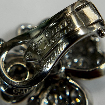Lot 130 - Van Cleef & Arpels Pair of Platinum and Diamond 'Cosmos' Flower Earclips