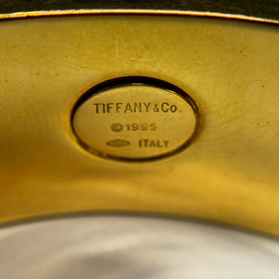 Lot 18 - Tiffany & Co. Gold 'Atlas' Bangle Bracelet
