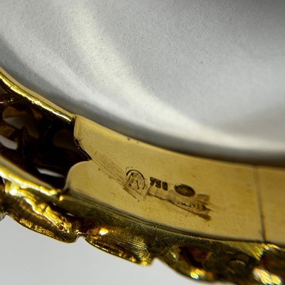 Lot 57 - Ilias Lalaounis for Zolotas Two-Color Gold, Diamond and Ruby Fish Bangle Bracelet