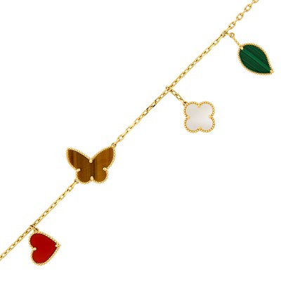 Lot 1160 - Van Cleef & Arpels Gold and Hardstone 'Lucky Alhambra' Bracelet, France