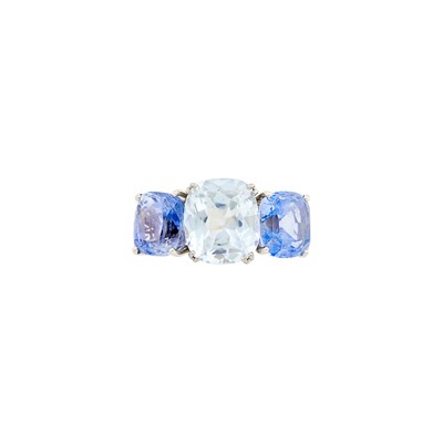 Lot 1154 - White Gold, Colorless and Blue Sapphire Ring