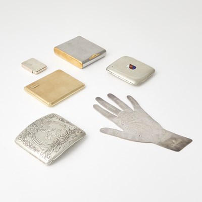 Lot 198 - A 14kt Gold Cigarette Case, Christofle Silver Plated Palmistry Hand, and Three Cigarette Cases