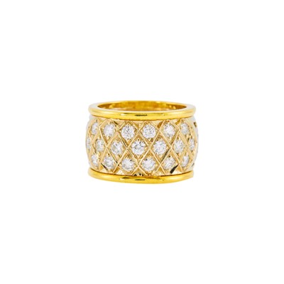 Lot 1035 - Two-Color Gold and Diamond Band Ring