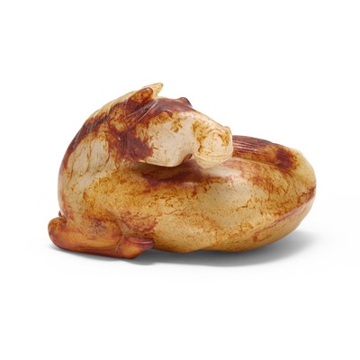 Lot 475 - A Chinese Russet Jade Figural Carving