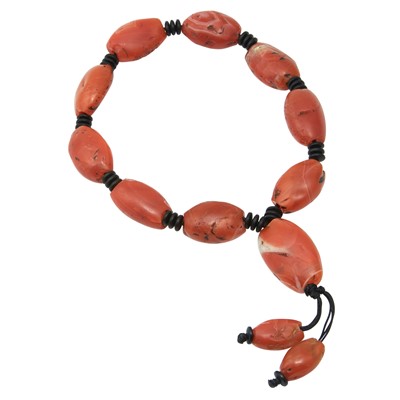 Lot 744 - A Strand of Tibetan Carnelian Pema Beads