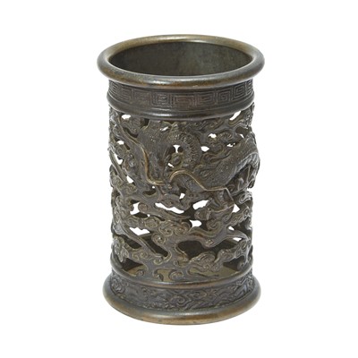 Lot 67 - A Chinese Reticulated Bronze Brush Pot