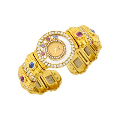 Lot 219 - Chopard Gold, Gem-Set and Diamond 'Happy Diamonds' Bracelet-Watch