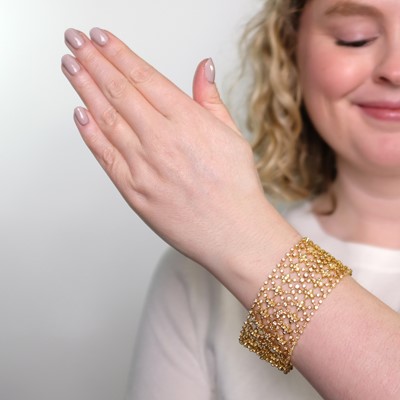 Lot 47 - Wide Gold and Diamond Bracelet