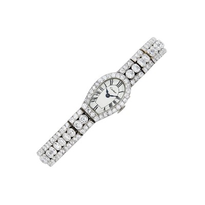 Lot 135 - Cartier Platinum, Gold and Diamond Wristwatch, France