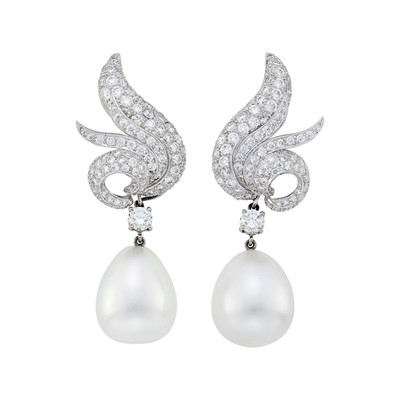 Lot 280 - Verdura Pair of Platinum, Diamond and South Sea Cultured Pearl 'Wing' Pendant-Earclips