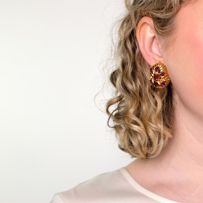 Lot 89 - David Webb Pair of Hammered Gold and Ruby Earclips