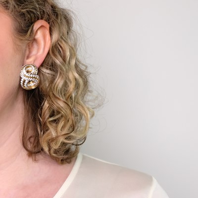 Lot 40 - Verdura Pair of Gold, Platinum and Diamond 'Figure Eight' Earclips