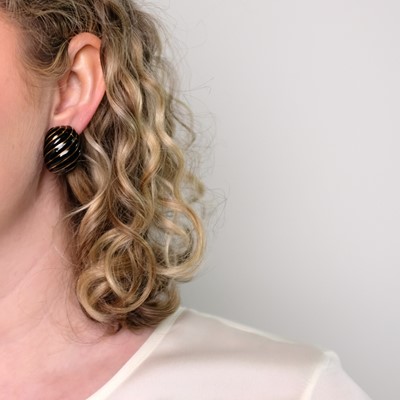 Lot 58 - David Webb Pair of Gold and Black Enamel Bombé Earclips