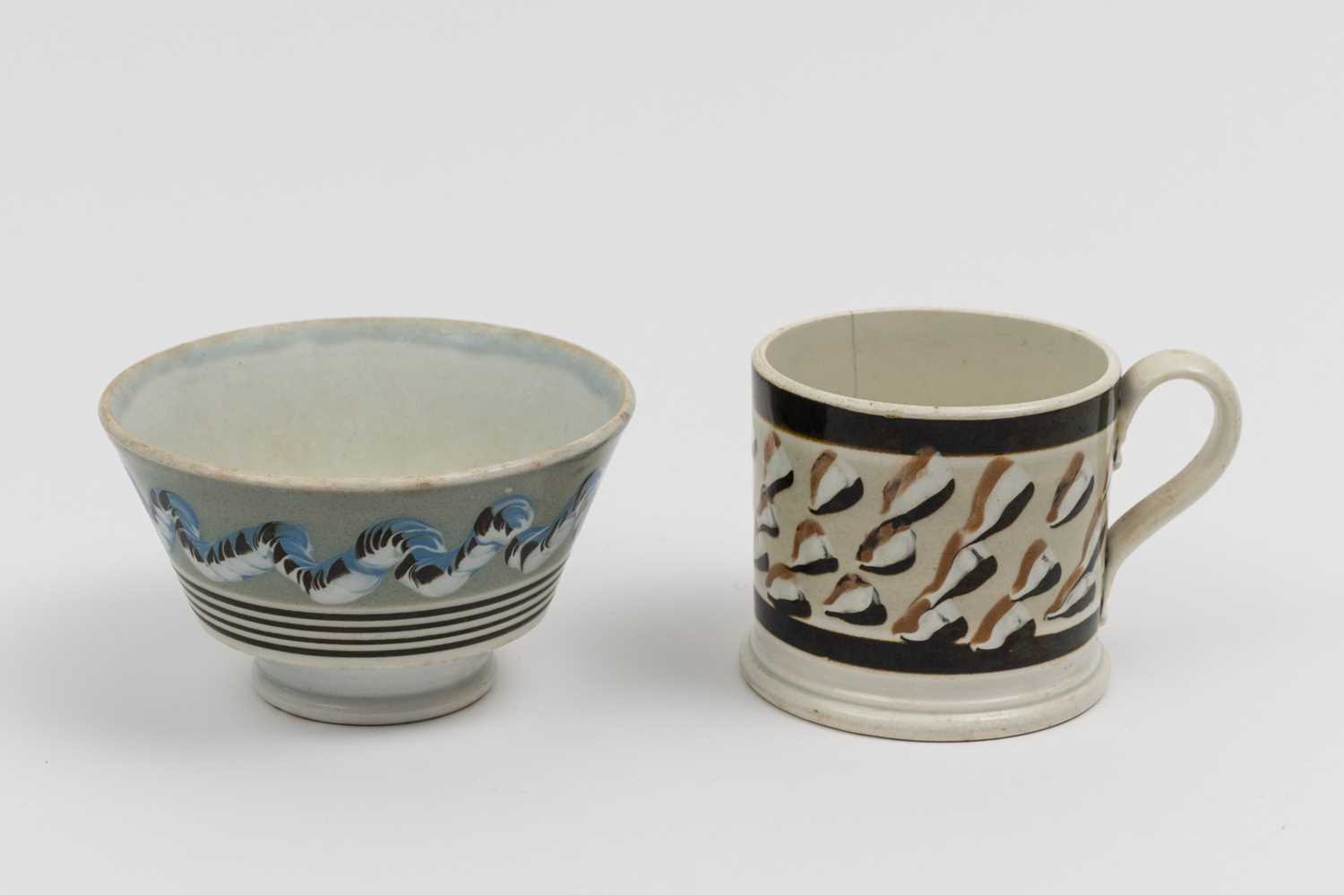 Lot 1081 - Two Slip-decorated Creamware Table Articles
