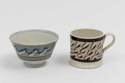 Lot 1081 - Two Slip-decorated Creamware Table Articles