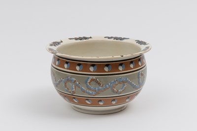 Lot 1079 - Slip-decorated Creamware Chamberpot