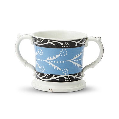 Lot 1084 - Slip-decorated Two-handled Pearlware Frog Mug