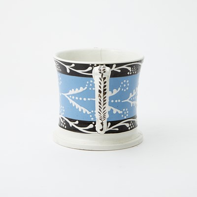 Lot 1084 - Slip-decorated Two-handled Pearlware Frog Mug