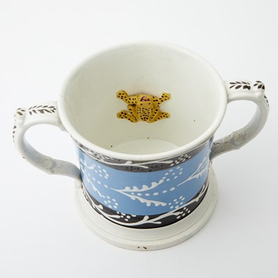 Lot 1084 - Slip-decorated Two-handled Pearlware Frog Mug