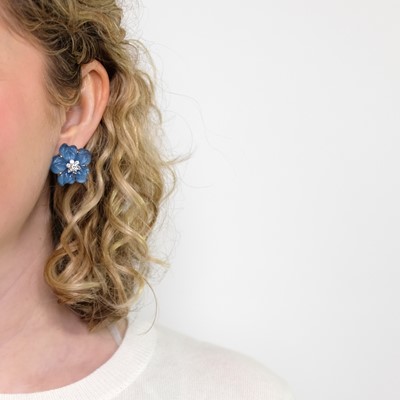 Lot 137 - Seaman Schepps Pair of Gold, Blue Chalcedony, Carved Crystal and Diamond 'Clematis' Earrings