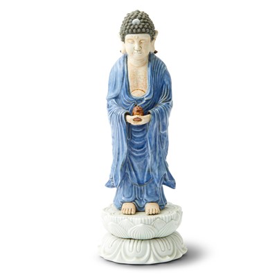 Lot 114 - A Japanese Enameled Porcelain Figure of Shakyamuni