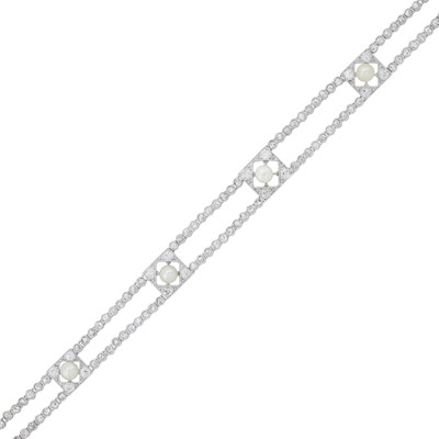 Lot 1183 - Belle Epoque Double Strand Platinum, Button Pearl and Diamond Bracelet
