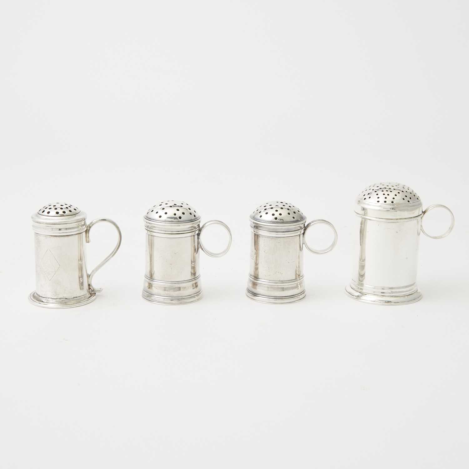 Lot 129 - Four Georgian English and Irish Silver Pepper