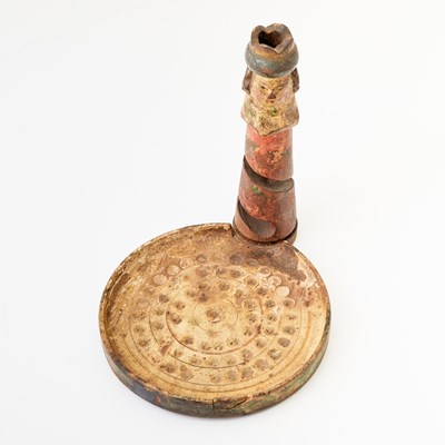 Lot 375 - A whimsical carved and painted wood game of chance in the form of a chess king