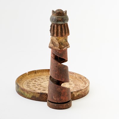 Lot 375 - A whimsical carved and painted wood game of chance in the form of a chess king