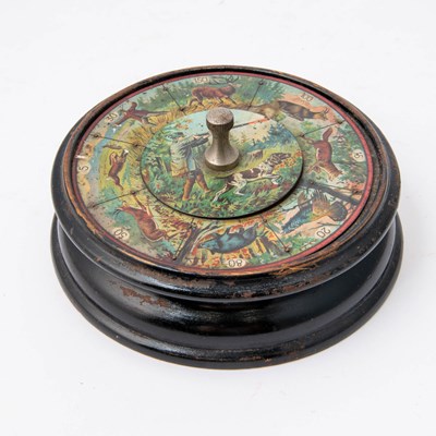 Lot 347 - Two painted tin circular rotating games