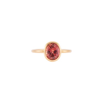 Lot 1082 - Rose Gold and Orange-Pink Sapphire Ring