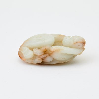 Lot 61 - A Chinese White Jade Carving of a Monkey
