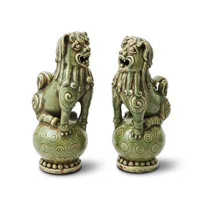 Lot 86 - A Pair of Chinese Longquan-Style Celadon Lions