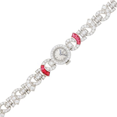 Lot 148 - Patek Philippe Platinum, Ruby and Diamond Wristwatch