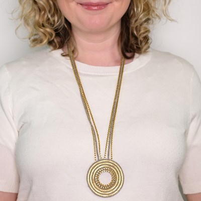 Lot 59 - Mario Buccellati Triple Strand Two-Color Gold Pendant-Necklace