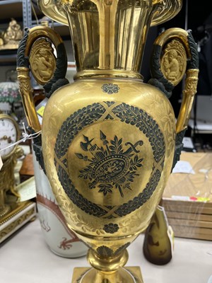 Lot 253 - Pair of Continental Gilt-Decorated Porcelain Two-Handled Vases