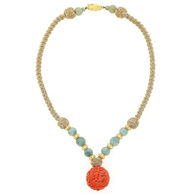Lot 2083 - Gold, Carved Coral and Jade Beads, Diamond and Cord Pendant-Necklace