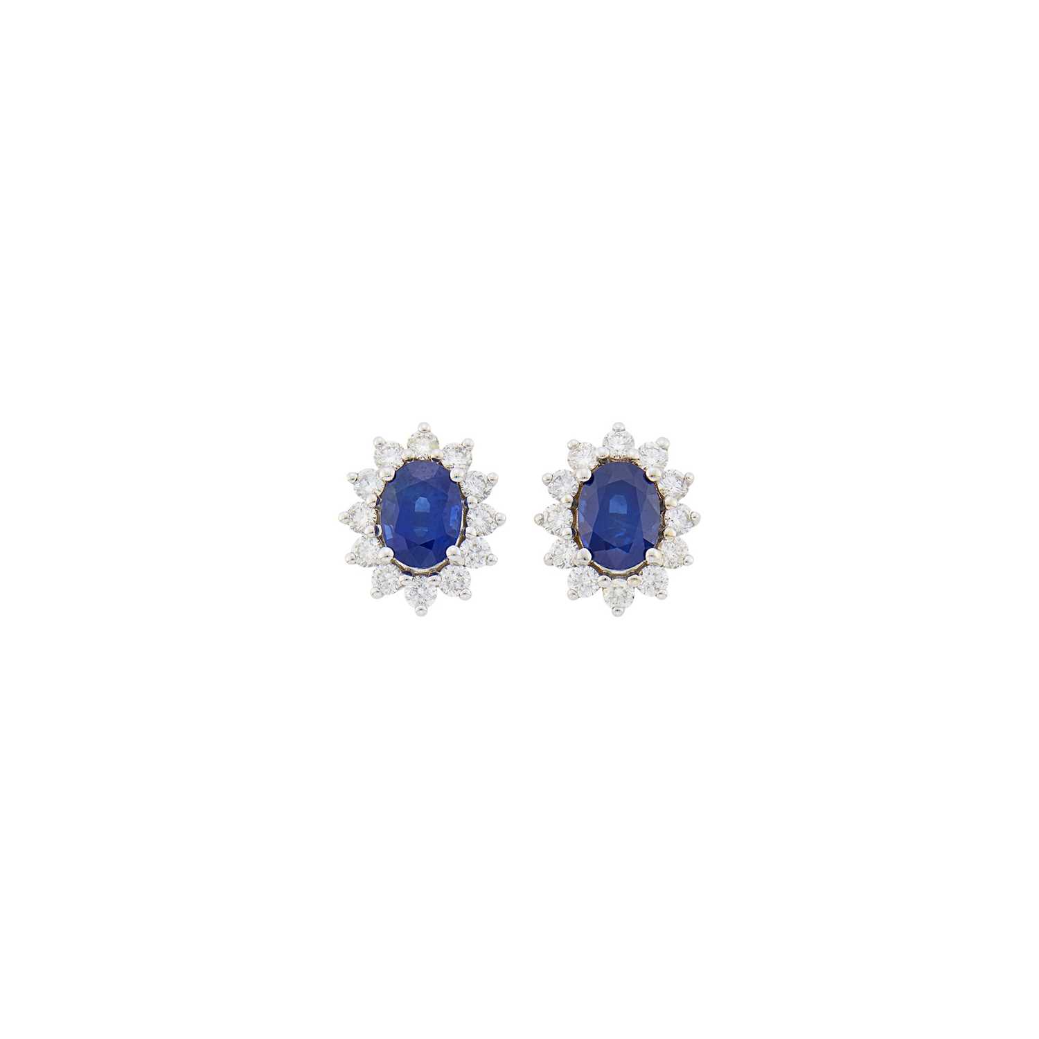 Lot 1080 - Pair of White Gold, Sapphire and Diamond Earrings