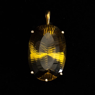 Lot 114 - Silver-Gilt, Smoky Lemon Quartz and Diamond Pendant