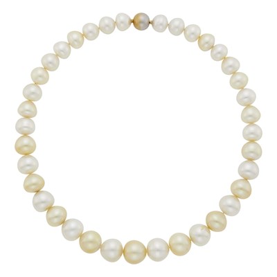 Lot 1135 - Paspaley South Sea and Golden Semi-Baroque Cultured Pearl Necklace with Two-Color Gold Ball Clasp