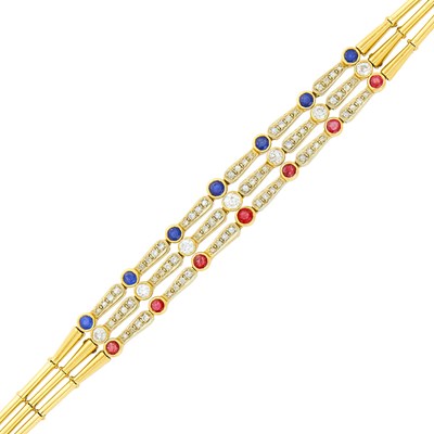 Lot 1083 - Triple Strand Gold, Diamond, Ruby and Sapphire Bracelet