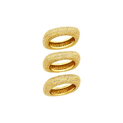 Lot 91 - Three Gold and Colored Diamond Stacking Rings