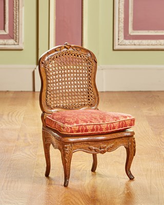 Lot 337 - Louis XV Caned Beechwood Miniature Chaise