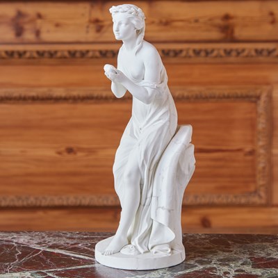 Lot 463 - SEVRES BISCUIT PORCELAIN FIGURE, ‘L'AMITIÉ TENDANT SON COEUR A DEUX MAINS’