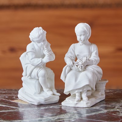 Lot 443 - TWO SEVRES BISCUIT PORCELAIN FIGURES, ‘LA FILLE AUX FRUITS’ AND ‘LE PETIT MUSICIEN’