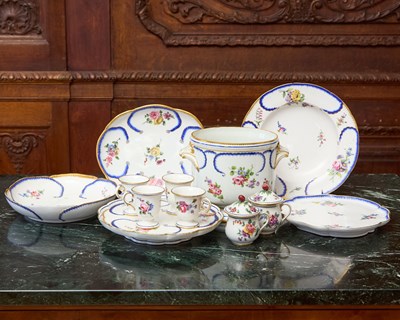Lot 477 - ASSEMBLED SEVRES PORCELAIN BLUE FEATHERED AND FEUILLE-DE CHOUX PART DESSERT SERVICE