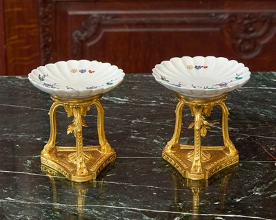 Lot 405 - Pair of Louis XV Gilt-Bronze Trefoil Stands Mounted with Chantilly Porcelain Fluted Dishes