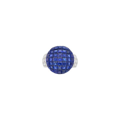 Lot 232 - Van Cleef & Arpels Two-Color Gold, Mystery-Set Sapphire and Diamond 'Ring Cap 2000' Ring, France
